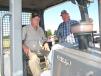 Charles (L) and William Goolsby, WCG Equipment, Bloomington Springs, Tenn., test dozers at the sale. 
 