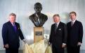 (Left to right) Mr. JCB's sons Mark Bamford and JCB Chairman Lord Bamford and his grandson Jo Bamford, Group MD of Global Accounts, proudly unveil a new bust of Joseph Cyril Bamford, founder of JCB.   