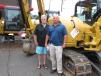 Kevin Flynn (L) and Fred Kurfehs, both of Orchard Holdings, Manasquan, N.J., bought a Caterpillar 305.5 mini-excavator. 