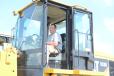 Checking out this Caterpillar 938H wheel loader is Steve Dalbow, business owner in Camden County, N.J. 