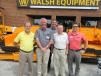 (L-R): Joe Wingerson of Brandt Paving; Walsh Equipment’s Mike Walsh and Brad Callihan; Joe Weist of Weist Paving; and LeeBoy’s Jeremiah Reinhardt gather for a picture in front of a LeeBoy 1000 paver. 