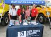 (L-R): J&J Truck Bodies’ Ron Wright, Larry Faidley, Emily Wentworth, Leigh Snyder and Corey Sechler welcome attendees to their equipment display. 