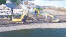Almost every size of excavator was used from the large Cat 336, an amphibious excavator used in dock removal.  
 