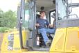 Steve Mosher, R&R Service Center, Stanfordville, N.Y., gets comfortable in the cab of a D65PXi. 