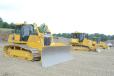 The dozers on display were set up in drag race style waiting for the attendees to lay some grade. 