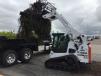 Valley Landscaping’s skilled operators remove shrubs and landscaping in minutes and load them in a truck for disposal 