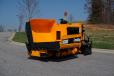 The hopper capacity is 7 tons (6.3 t), which enables the paver to handle the asphalt load of a standard size paver while getting in the tightest of spaces.   
 