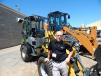Greg Ramer, Wacker Neuson market development specialist, answers questions about this Wacker Nueson WL32 compact wheel loader at the Titan Machinery display. 
