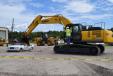 The main event featured four members of the club using a Kobelco SK350 excavator to crush either a Jaguar or Mercedes Benz.  