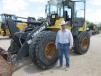 David Smith, an independent contractor of Goldthwaite, Texas, considers bidding on this Komatsu WA 250 PZ loader. 
 
