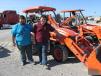 Garrett (L) and Westen Champlain, Andes Farms of Winfield, Kan., think this Kubota loader/backhoe will be the perfect fit for the project on the farm. 
 