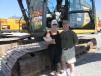 While on their honeymoon, Sara (L) and Dana David Jones, Grassroots Cattle Company LLC of Barwick, Ga., thought they would see about adding this Cat 336E excavator to their equipment base for the ranch. 
 