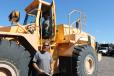 Dan Northcott sits behind the wheel of this Dressta wheel loader, while his brother, Ben, looks at the specs. They are co-owners of Fuzzy Brothers Excavation of Walpole, N.H. 