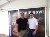 Scott Wiese (L),  territory manager, and Curt Compagnone, both of Purple Wave, attend the event. 
