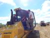 Dean Alfers (R), sales, Road Builders, Norfolk, Neb., helps  Seth Cech, equipment operator of Cech Excavating, Clarkson, Neb., with this  Komatsu D51PXi 22 dozer.
