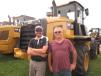 Sean (L) and Jack Maloney, both of Merc Group LLC, stand in front of this Cat 926M wheel loader.
 