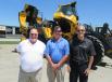 Jamie Terrill III, Louisville branch vice president of Rudd Equipment Company, is flanked by Andy Capps (L), district products representative, Volvo, and Tony Spake, Volvo director key accounts, to present Volvo’s L150H wheel loader with a tilting cab for improved service and maintenance access. 