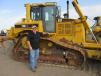 Trent Diekhoff of ETI Equipment & Truck, Loveland, Colo., checks out all the whistles and bells on this Cat D6R XL. 