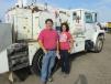 Scott Lesuer (L) and Ashley Sanders of Rensel Construction in Central, Colo., pause for a photo with this International field service truck. 