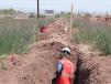 ADOT photo.
After identifying possible cultural resources sites, archaeologists complete field investigations by digging systematic 5-ft. (1.5 m) deep trenches. 