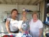 (L-R): Karri Lane, Mary Ellis Metz and Jackie Hritz, all of CAWGC, register attendees for the annual steak fry. 
 