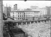 5th and Mission 1924, Chronicle Building under construction, Old Mint across the street. Courtesy of OpenSFHistory.org. 