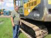 Ed Watkins of Watkin’s Power Packs in Spring, Texas, gives this Volvo EC210B a good inspection. 
 