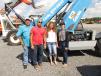 (L-R): Larry Vasques, Julio Enanorado, Nancy Lazo and Jennifer Calles of J. Construction in Conroe, Texas, have all decided that this Genie GTH 6622 high lift will be the machine they bid for. 
 