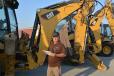 Larry Gaylor, GL Gaylor Construction of Indio, Calif., inspected the long line of backhoe loaders including this Cat 420F. 