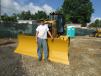 Shane Baldwin, Carrow Construction, Newark, Del., looks over this Cat D5K2 track-type tractor. 