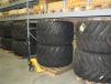 Off-road truck tires for all Hydrema models are stocked in the parts warehousing area.
 