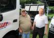 Joe Dawson and Jim Burkhammer of Cenweld Truck Bodies & Equipment stand at the Valley Ford Truck Sales equipment display.
 