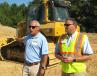 Charlie Stevens (L), Thompson Tractor, and Sam Meeker, Caterpillar, provide preliminary information on the D6N machines with integrated advanced Cat GRADE technologies before the demo began. 