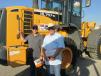 Chad Ray (L) and his father, Steve Ray, of Leasing Systems Inc., Nashville, Tenn., plan to bid on — and win — this Hyundai HL 757-9 loader. 
 