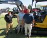 (L-R): Richard Springer of Shearer Equipment joins  Ted Crane, Brent Chauvin and Eric Bischoff, all of Murphy Tractor & Equipment, to man the John Deere Equipment display.
