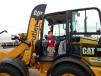 Charlie Schulz from Fargo, N.D., has a great time in this Cat 906M compact wheel loader at the Butler Machinery outdoor display area. 
