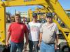 Dale Sarvey, Stuart Mettler and John Sliwinski, all of JS Northeast Company in Girard, Ohio, shop for excavators at the auction. 