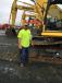 Blake Morehead of Complete Demolition Services in Carlton, Ga., looks over the Komatsu excavators.
 