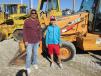 Joe Rod (L) of Joe Rod Services in Bowie, Texas, decided to bring his son, Justus, with him to see about this Case 580 Super M backhoe. 
 