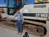 Carlton Hampton, an independent contractor of Brownwood, Texas, looks over this 210 Link-Belt excavator. 
 
