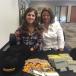 Katie (L) and Laura Riley helped customers register for all the wonderful door prizes.