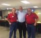Craig Wolfley (C), former Pittsburgh Steeler and Minnesota Viking, came to the open house to greet customers. He also talked with Claude Bynum (L) and Alan Frederick, Murphy Tractor parts representatives. Wolfley podcasts weekly on The Craig Wolfley Podcast. 