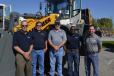 (L-R): Ken Cunningham, Alan Petry, Kevin Murphy, Marcus Barnes and Jason Brady, all of Liebherr, present the new Liebherr 566X wheel loader equipped with a new hydrostatic power shift transmission. 