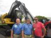 (L-R): Bill Linssen and Chad Monnet, both of Fabick CAT, welcome Chuck Barnowsky of Lake Shore Forrest Products.
 