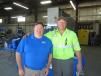 Tom Elam (L), Roland Machinery Co., gives Bret Saal of Otto Baum Contractors a tour of the shop area of the Peoria facility.
 