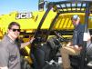 Neal Adams (L) and Charles Webster, both of Adams Masonry, Chattanooga, Tenn., get a closer look at this JCB 510-56 telescopic forklift.