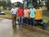 (L-R): Brian Dillenback of James River Equipment goes over the features of the excavators with Bill Sowers and Chris Prince, both of State Contractors in Wake Forrest, N.C., and Gary Gibbs of Hawthorne Development in Belmont, N.C.  