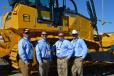 Yellowhouse Machinery Co. displayed the full line of John Deere construction equipment, including the 850K dozer. (L-R) are Brad Downing, Burt Stringer, Eric Schiel and Reid Layton, all of the Yellowhouse Odessa branch.
 
