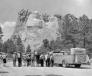 Tourists stopped to view Mount Rushmore while it was still under construction, c. 1930s. Image courtesy of Bill Groethe.	
	
 