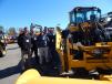 Nuss Group sales specialists with a Volvo L98 loader (L-R) are Pete Stroh, Mankato, Minn.; Milt Luttrell and Eric Suppan, St. Cloud, Minn.; Randy Shaver, Rochester, Minn.; and Scott Leseman, Roseville, Minn.
